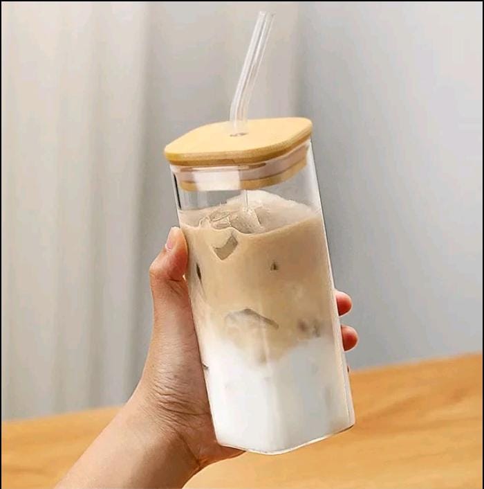Transparent glass cup with bamboo holed lid
