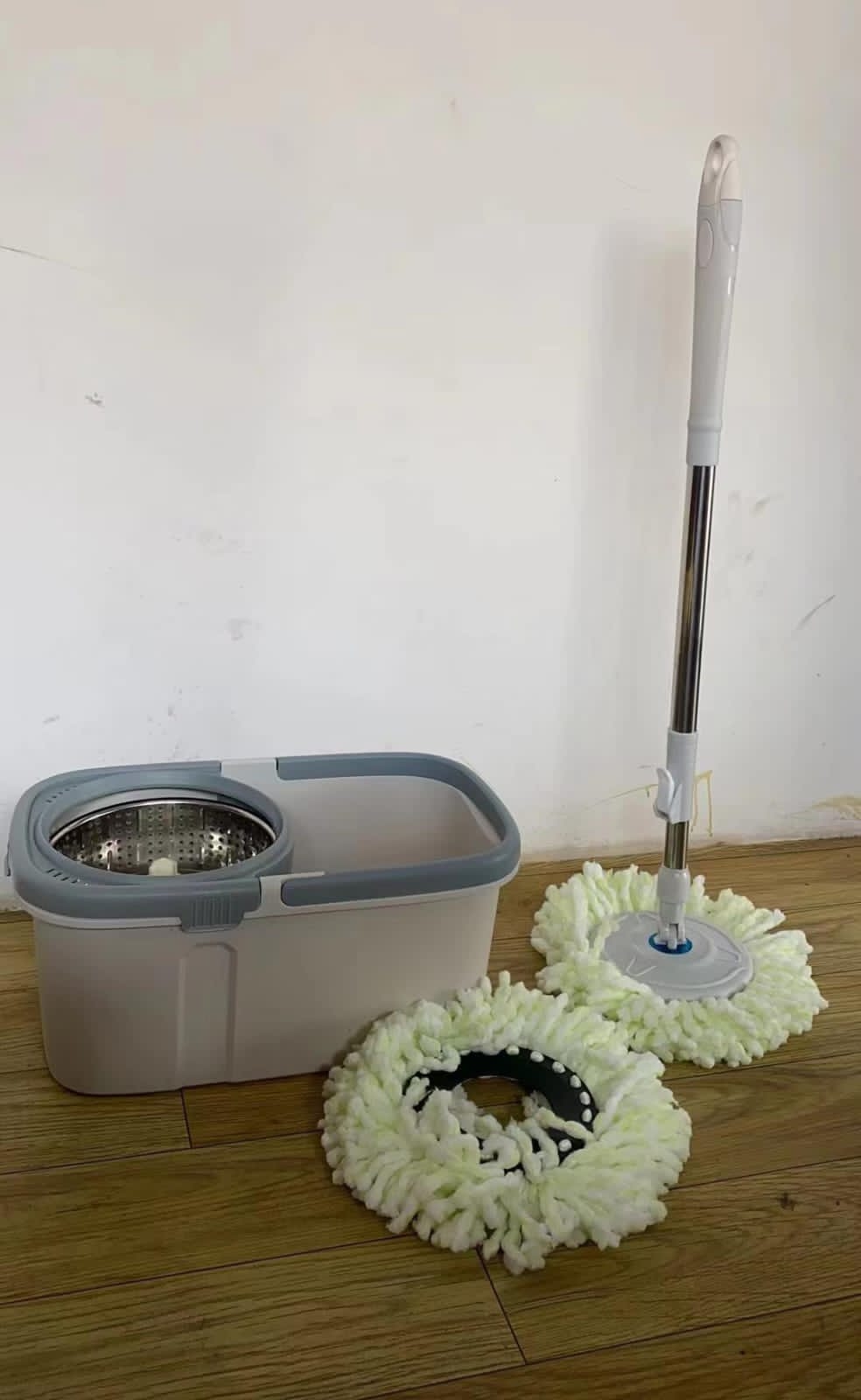 Heavy duty 360 degree rotating mop with a bucket