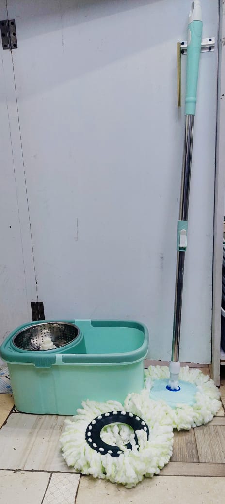 Heavy duty 360 degree rotating mop with a bucket